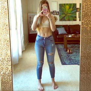 distressed denim. frayed ankle. super stretchy